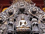 Kathmandu Patan Golden Temple 05 Buddha On Torana Above Inside Entrance Door